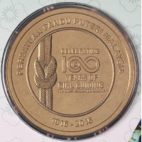 Монета Малайзия 1 ринггит 2016 100 лет Женской организации скаутов