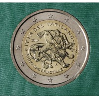 Монета Ватикан 2 евро 2010 Год священников (буклет)